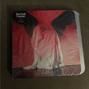 Fabric 56 Music CD with Red and Black Design